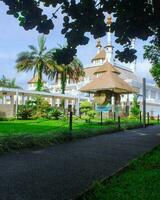 White grand mosque with golden dome, tasikmalaya, west java, indonesia photo