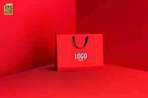 Red paper bag and black handle realistic vector design. Blank logo for insert your Branding. You can used for Marketing online, sales, presentations layout, advertising, promotion campainge, print ad.