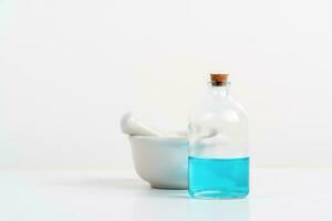 some test tube on the white table with beakers, flasks, and test tubes filled with colorful liquids photo