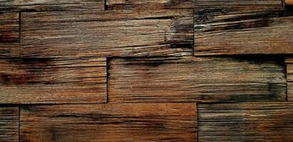 Grunge or rough dark brown wooden wall or floor for background. photo