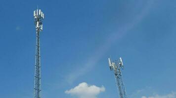 Telephone towers used to broadcast signals at dusk. photo