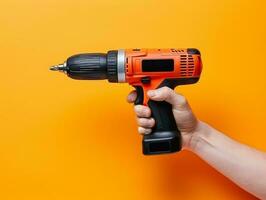 Hand-holding power drill photo