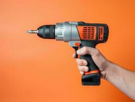 Hand-holding power drill photo