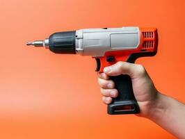 Hand-holding power drill photo