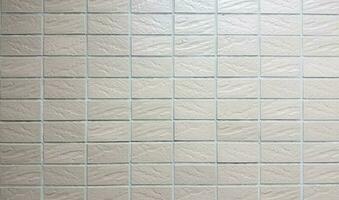 Light brown tile wall with texture photo