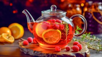 bio fresh home made fruit tea in a glass teapot, made with photo
