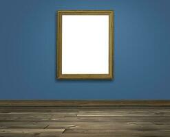 Golden picture frame on Colored wall and brown wooden floor photo