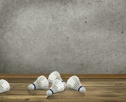 Badminton ball or shuttlecock in room concrete wall texture with wooden floor photo