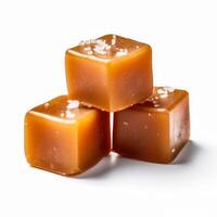 Delicious salted caramels isolated on white background, photo