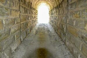 A light in the end of a tunnel. Passage under the railway photo