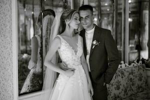 bride and groom inside a cocktail bar photo