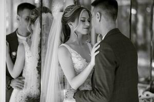 bride and groom inside a cocktail bar photo