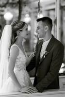 bride and groom inside a cocktail bar photo