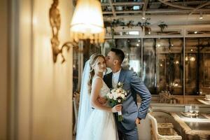 bride and groom inside a cocktail bar photo