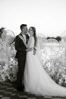 bride and groom against the backdrop of a yellow sunset photo