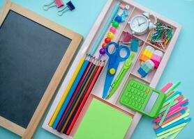 Stylish colored stationery.  Workplace. Organization of a drawer at the workplace. Storage and order of office supplies. Concept back to school. photo