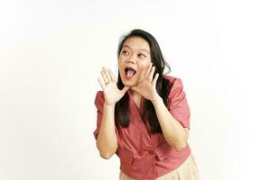 Announcement with hands over mouth Of Beautiful Asian Woman Isolated On White Background photo