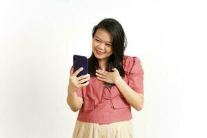 Smiling and Using Smartphone Of Beautiful Asian Woman Isolated On White Background photo