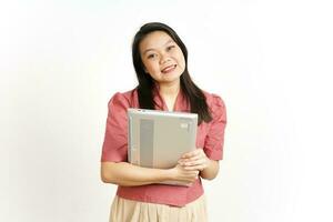 Looking at camera and Holding laptop Of Beautiful Asian Woman Isolated On White Background photo