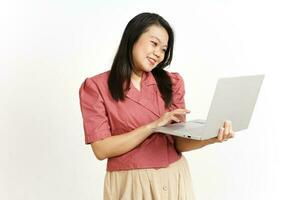 Standing and Working With Laptop Of Beautiful Asian Woman Isolated On White Background photo