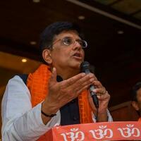 New Delhi, India - November 27 2022 - Piyush Goyal Cabinet Minister and core member of Bharatiya Janata Party - BJP during a rally in support of BJP candidate ahead of MCD local body Elections 2022 photo