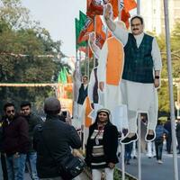 New Delhi, India - January 16 2023 - Prime Minister Narendra Modi cut out during BJP road show, the statue of PM Modi while attending a big election rally in the capital photo