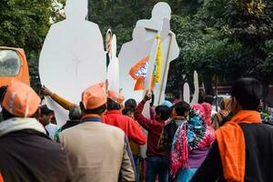 New Delhi, India - January 16 2023 - Prime Minister Narendra Modi cut out during BJP road show, the statue of PM Modi while attending a big election rally in the capital photo