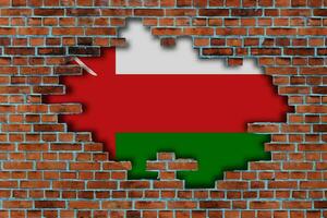 3D Flag of Oman behind the broken old stone wall background. photo