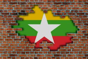 3D Flag of Myanmar behind the broken old stone wall background. photo