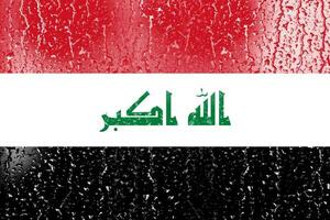 3d bandera de Irak en un vaso foto