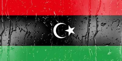 3D Flag of Libya on a glass photo