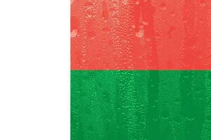 3D Flag of Madagascar on a glass photo