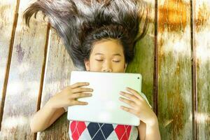 Children playing tablet photo