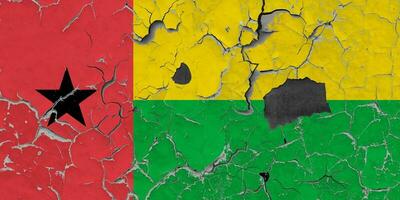 3D Flag of Guinea-Bissau on an old stone wall background. photo