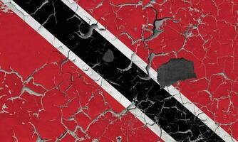 3D Flag of Trinidad and Tobago on an old stone wall background. photo