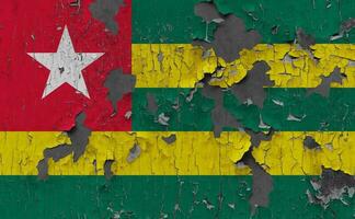 3D Flag of Togo on an old stone wall background. photo