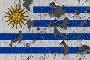 3D Flag of Uruguay on an old stone wall background. photo