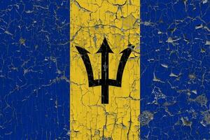 3D Flag of Barbados on an old stone wall background. photo