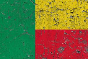 3D Flag of Benin on an old stone wall background. photo