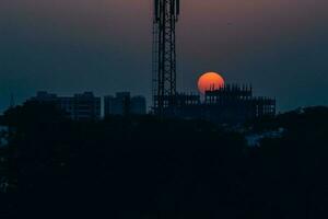 silhouette of building during sunset photo