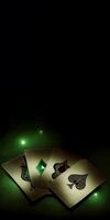 Golden Poker or Playing Cards with Light Effect on Dark Green Background. Concept of Gambling, Casino Game. . photo