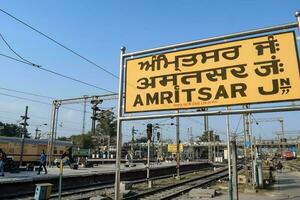 Amritsar railway station platform during morning time, Amritsar Railway station banner at Amritsar, Punjab railway station photo