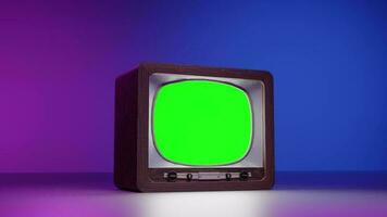 Retro TV with green screen against neon illumination video