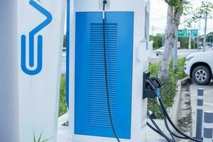 EV charging station for electric car in concept of green energy and eco power produced from sustainable source to supply to charger station in order to reduce CO2 emission . photo