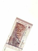 Isolated white photo of one piece of 100 ringgit malaysian bank notes