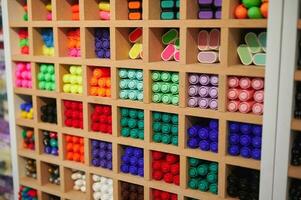 Close-up assortment of colorful multicolored vibrant felt tip pens on display for sale in school stationery shop photo