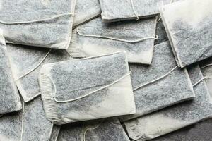 Lots of tea bags isolated background photo