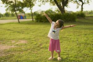 Pretty girl raising hands for her success, concept of success in life,Sstkhome. photo