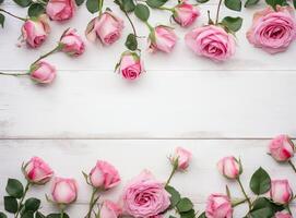 round frame wreath pattern with roses, pink flower buds, branches and leaves isolated on white background. flat lay, top view created with technology. photo