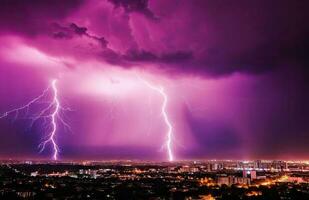Lightning storm over city in blue light created with technology. photo